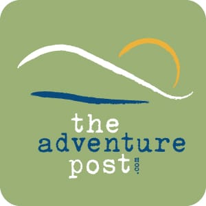 The Adventure Post logo featuring stylized mountain and sun graphic with clean, outdoor-inspired typography on a large light green background