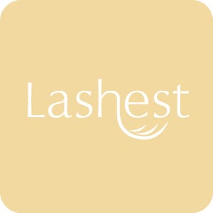 Lashest eyelash extensions logo in white on a square beige background